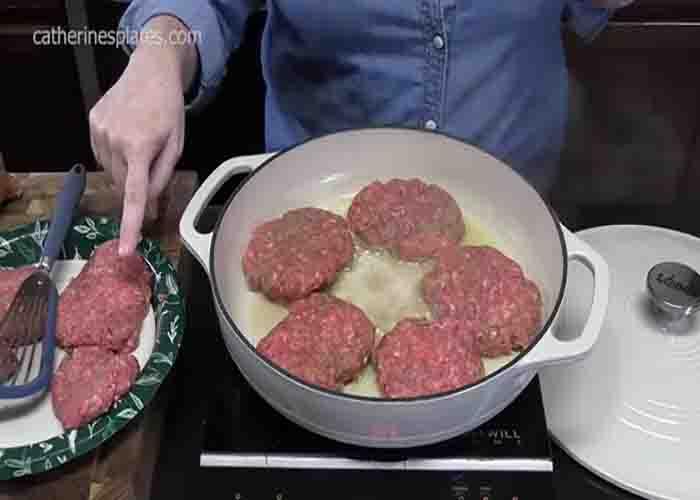 Cooking the Salisbury steak patties