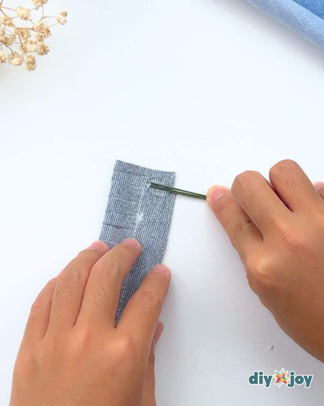 Denim Flowers From Old Jeans — add the stem