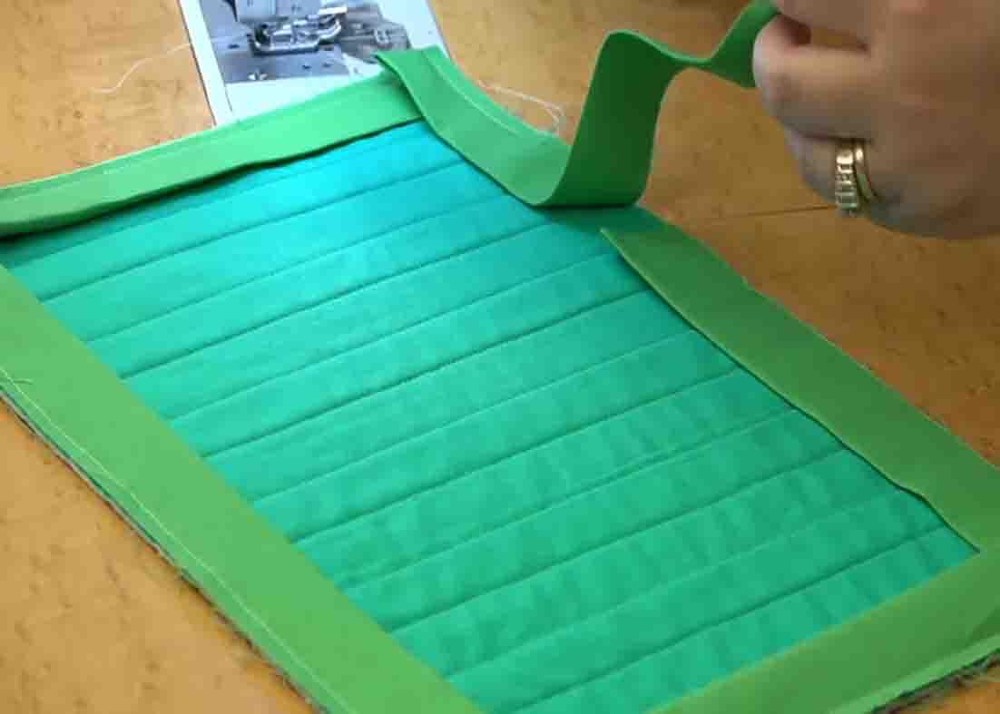 Overlapping the two unsewn parts of the binding