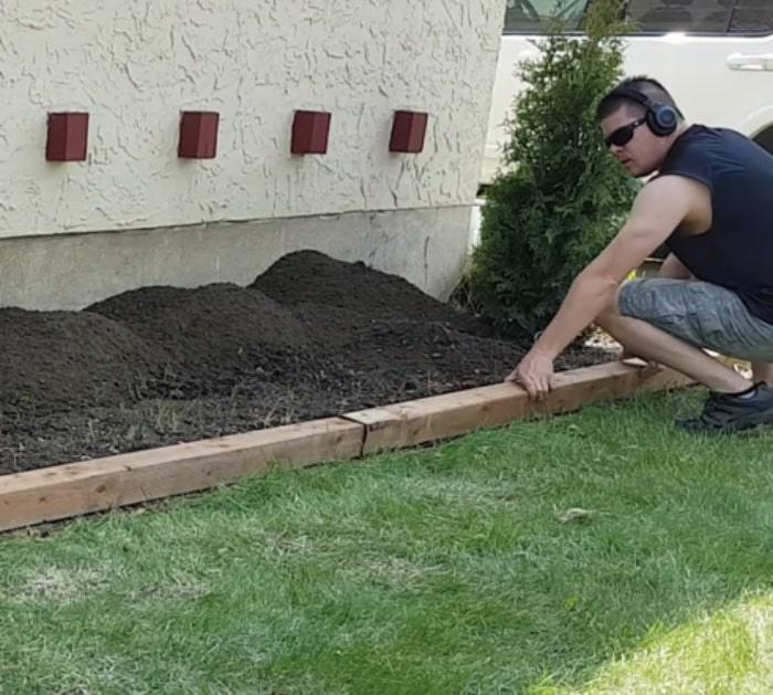 Make a DIY easy cheap garden bed edge anyone can do