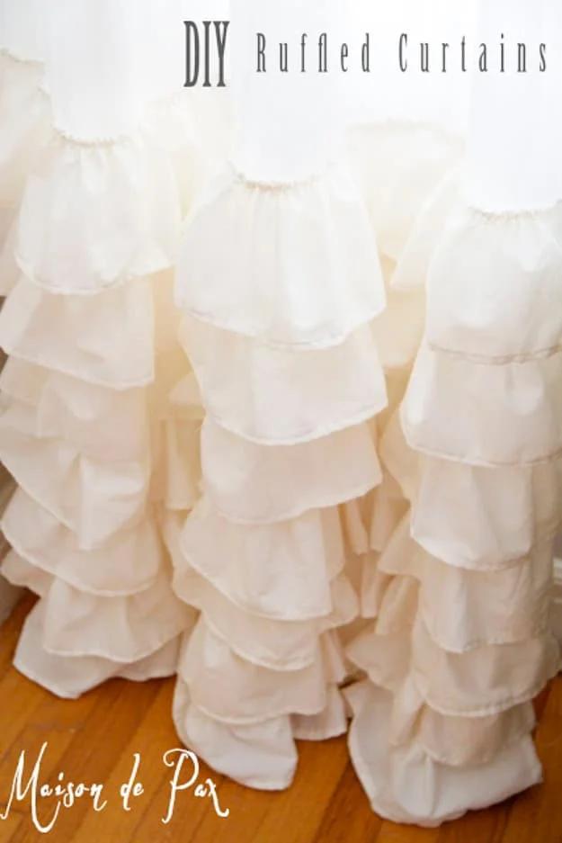 DIY curtain panels in cream muslin covered in soft horizontal ruffles, with a title reading DIY Ruffled Curtains