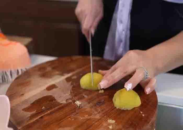 Chopping the potatoes for the potato salad