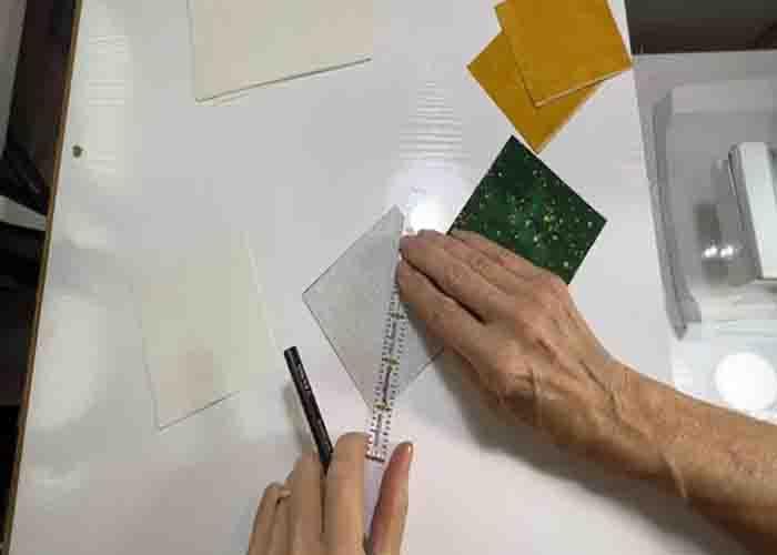 Making the half-square triangle units for the old grey goose quilt block