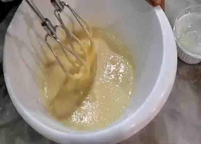 Mixing the flour to make the cornbread batter