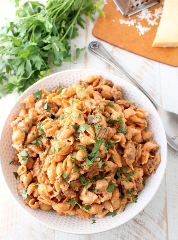 One pot Italian sausage shells and cheese, small pasta shells in a creamy tomato sauce with chopped parsley