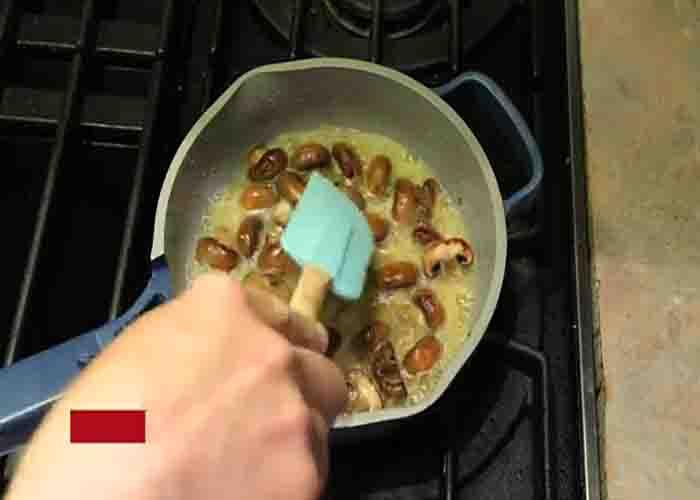 Sauteeing the mushrooms in olive oil and butter