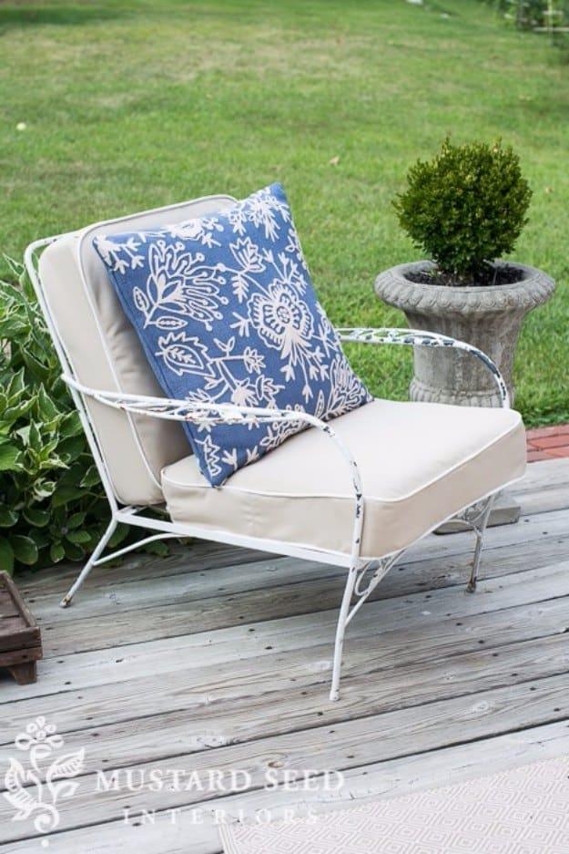 How to make a chair cushion, a home sewing project with a cream boxed cushion on a white metal chair on a deck