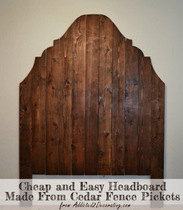 DIY wood headboard from cedar fence pickets, a dark stained scalloped three peak plank headboard on a cream wall