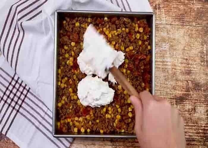 Layering the taco bake casserole