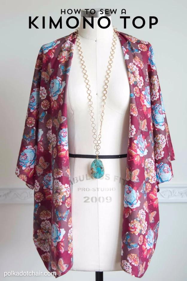 A floral rayon kimono jacket with narrow hemmed edges hanging open on a wooden rail, among the things to sew and sell.