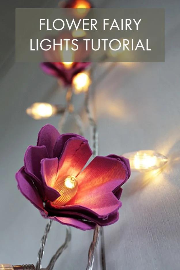 Graphic titled Flower Fairy Lights Tutorial over purple egg carton blooms glowing with warm fairy lights inside them