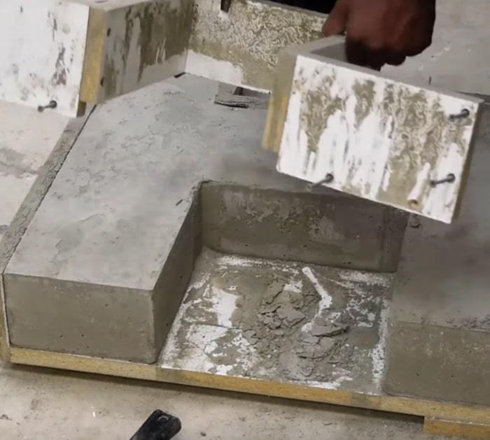 Make a modern style concrete and wood bench