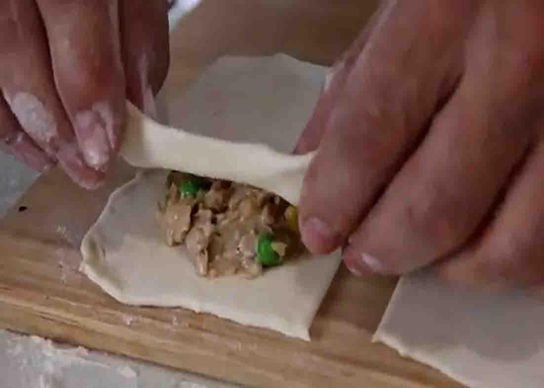 Assembling the tuna pies