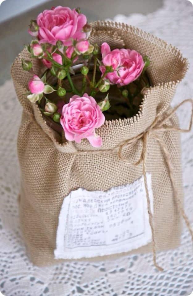 Flowers Wrapped In Burlap, a burlap decor idea that looks far pricier than it is and a popular choice on this list