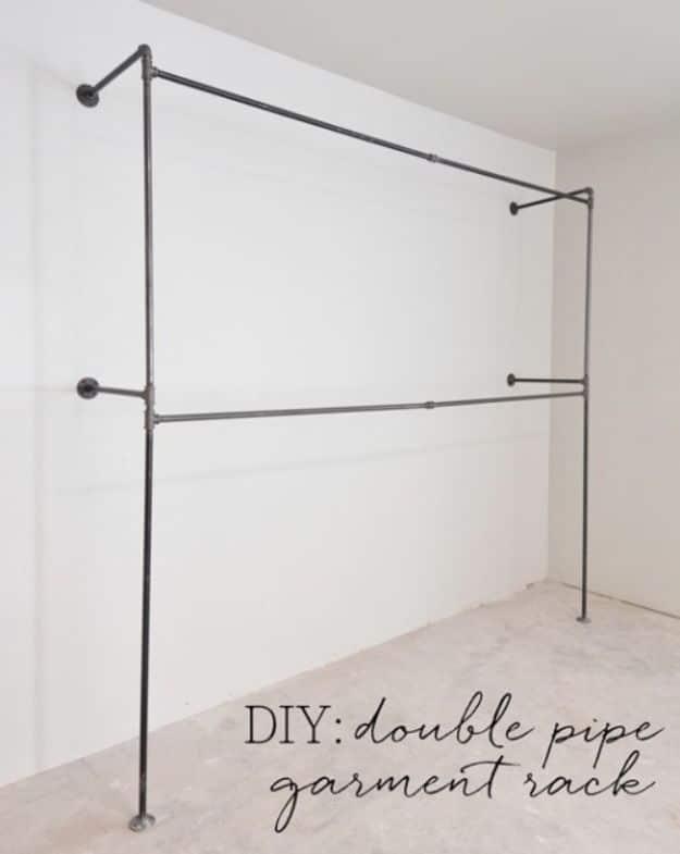 DIY Double Pipe Garment Rack, cheap to pull off with dollar store finds and a piece worth keeping out on display
