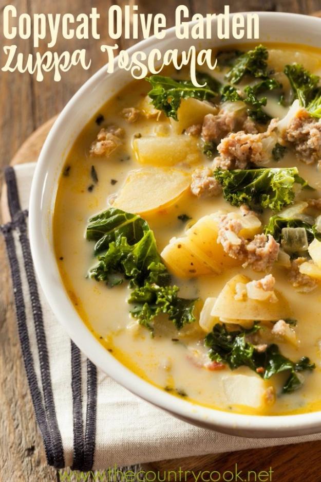 Copycat Olive Garden zuppa toscana with Italian sausage, sliced potatoes, kale and bacon in cream broth