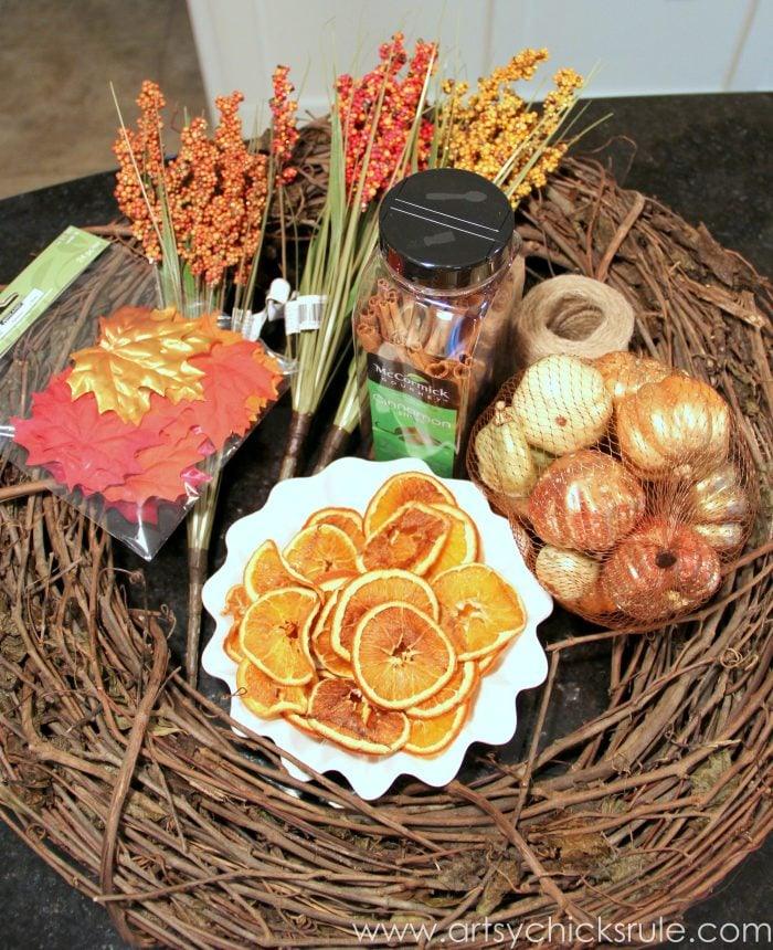 Wreath of dried orange slices and cinnamon sticks, a fragrant autumn wreath for a front door in October