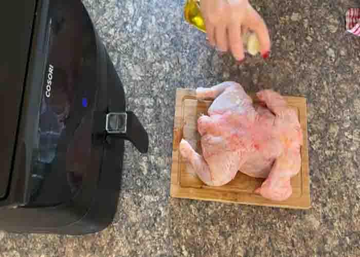 Oiling the whole chicken before air frying