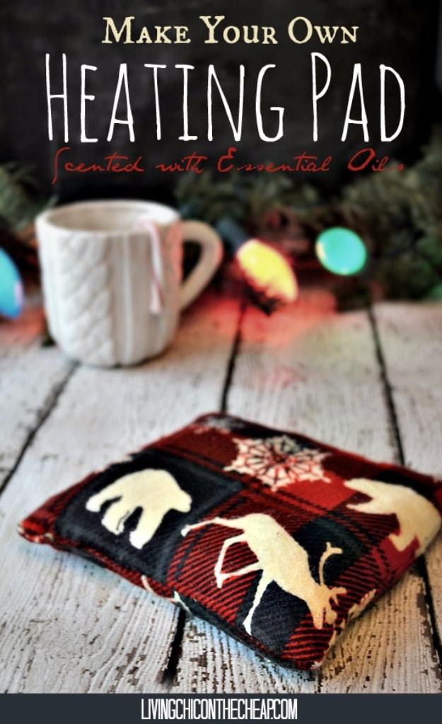A flannel heating pad filled with scented rice, a kraft label tied on, resting on a folded stack of fabric scraps
