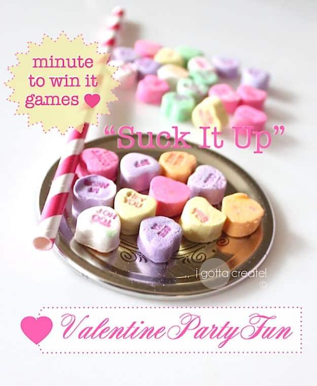 Suck it up Valentine minute to win it game with a conversation heart held on the end of a paper straw