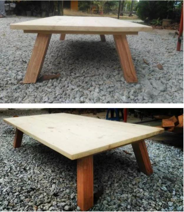Low light wood coffee table with angled legs on gravel, shown from two angles in a stacked two panel photo