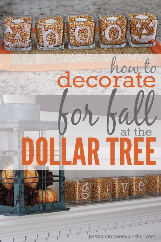 Glass votives filled with popcorn kernels and lettered to spell BOO and give, lined up on a white mantel