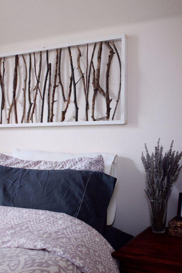 DIY Branch Art Headboard, one of the best rustic wall art ideas on this list and an idea worth saving for later