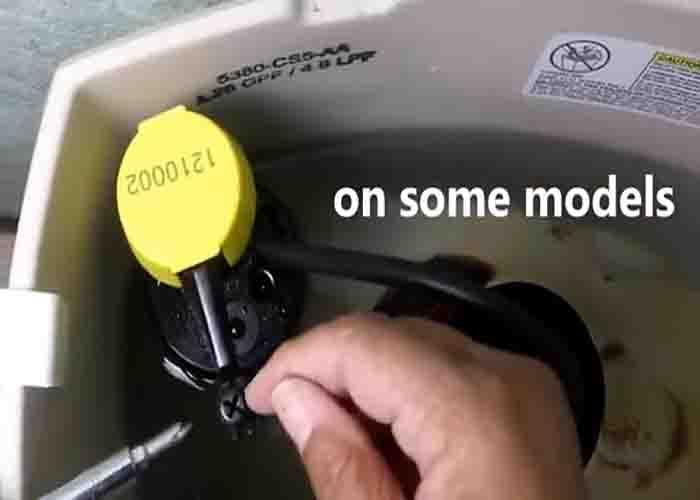 Adjust the screw inside your toilet tank to stop water from running