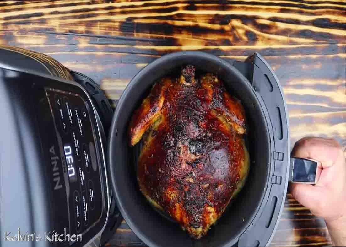 Flipping the chicken in the air fryer
