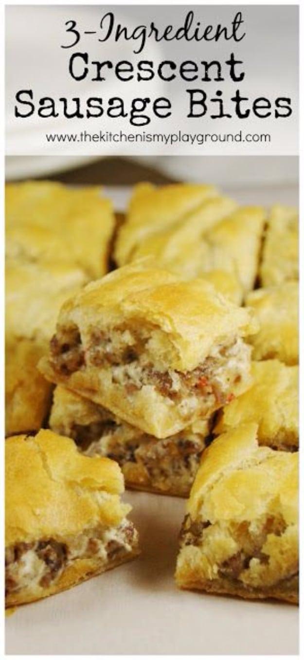 Crescent sausage bites cut into squares on a board, a 3 ingredient party appetizer made with crescents