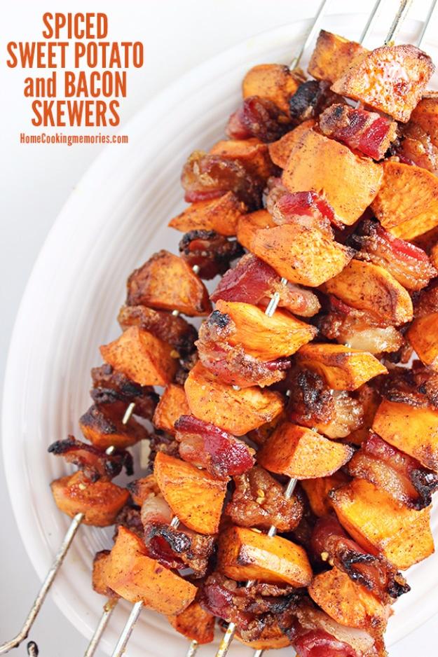 Spiced sweet potato and bacon skewers on a rack, coated in brown sugar, cinnamon and cayenne for a backyard BBQ