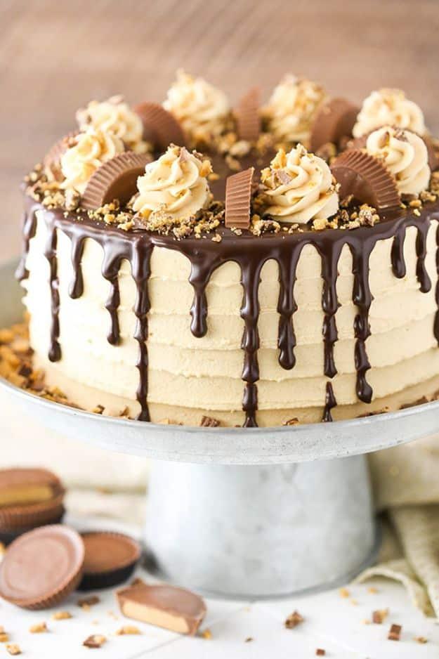 Peanut butter chocolate layer cake with peanut butter frosting and chopped Reeses cups on top recipe for a celebration