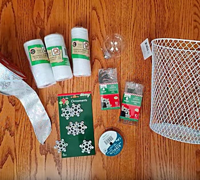 Learn to make a DIY Mesh Angel using a waste paper basket