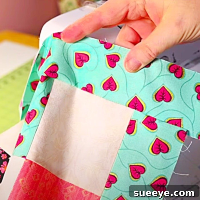 Craft Your First Patchwork Pillow 2 How To Sew A Pillow - Easy Sewing Project - Free Sewing Pattern - showcasing fabric strips sewn into a patchwork pattern