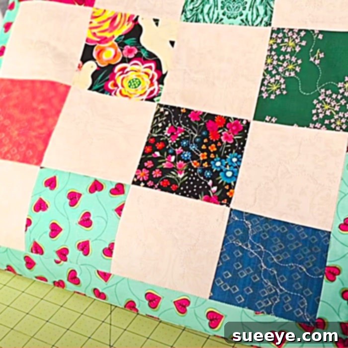 Craft Your First Patchwork Pillow 3 How To Make A Patchwork Pillow - Easy Patchwork Pillow Pattern - Free Pillow Pattern - demonstrating the envelope backing construction