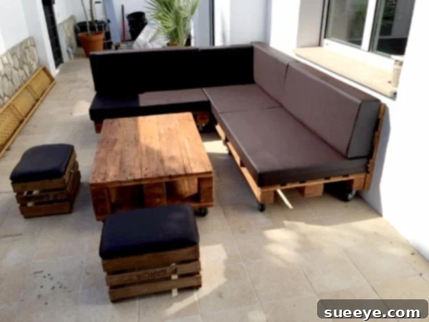 Build a Budget-Friendly Pallet Sectional Sofa DIY pallet sectional sofa with black cushions for indoor or outdoor use
