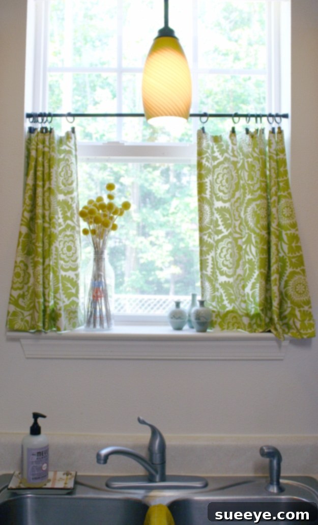 Cute DIY Cafe Curtains Charming DIY cafe curtains with a patterned fabric.