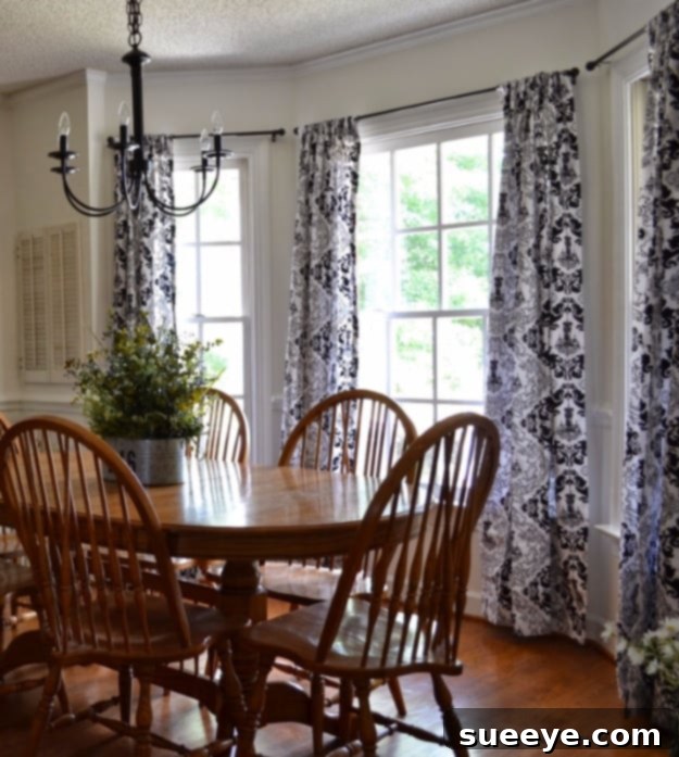 No Sew Repurposed Curtains No-sew repurposed curtains adding style to a bedroom.