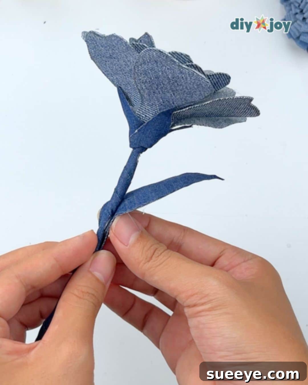 DIY fabric flower idea: attaching the main leaf to the stem