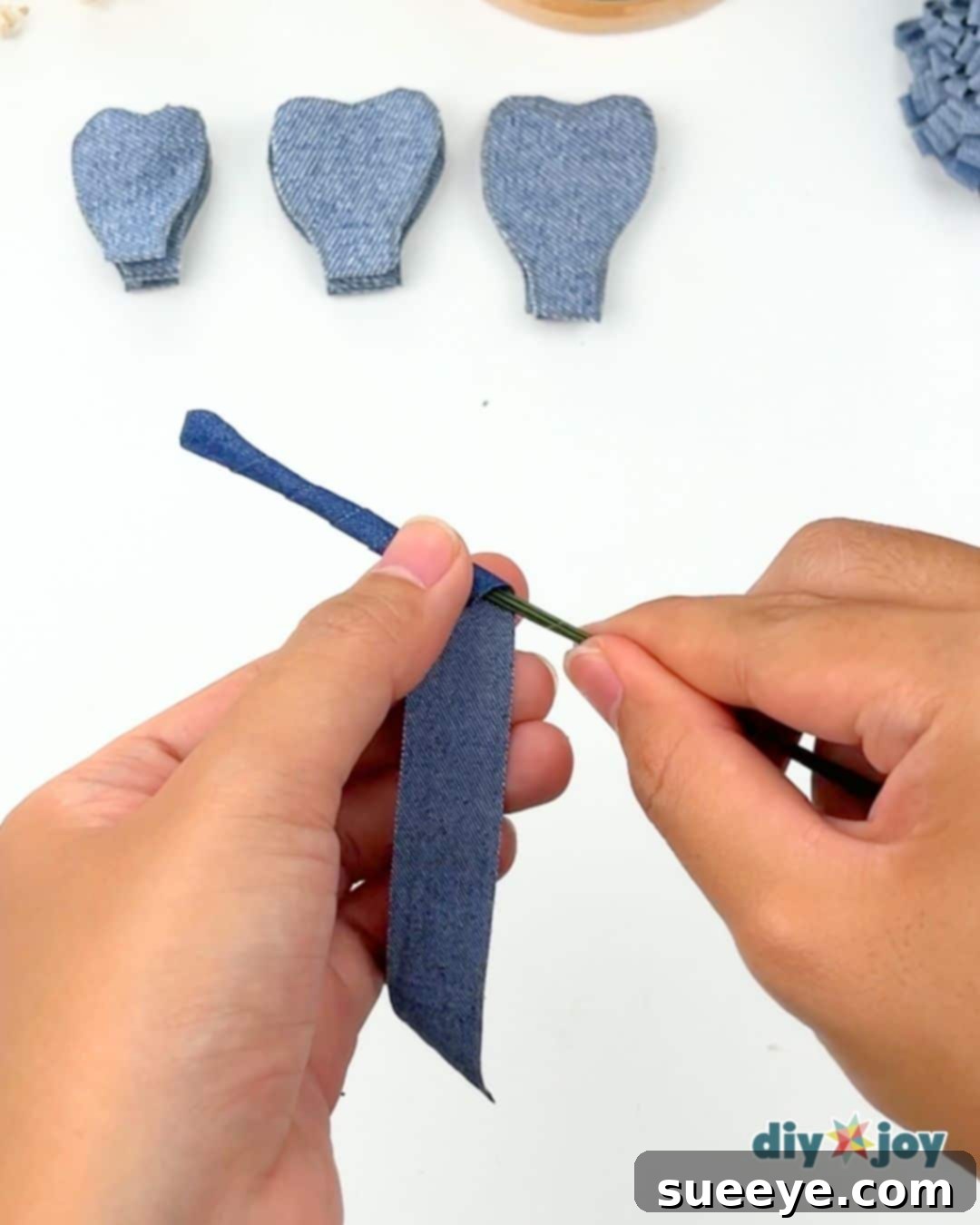 Upcycling old jeans ideas: crafting a fabric-wrapped stem