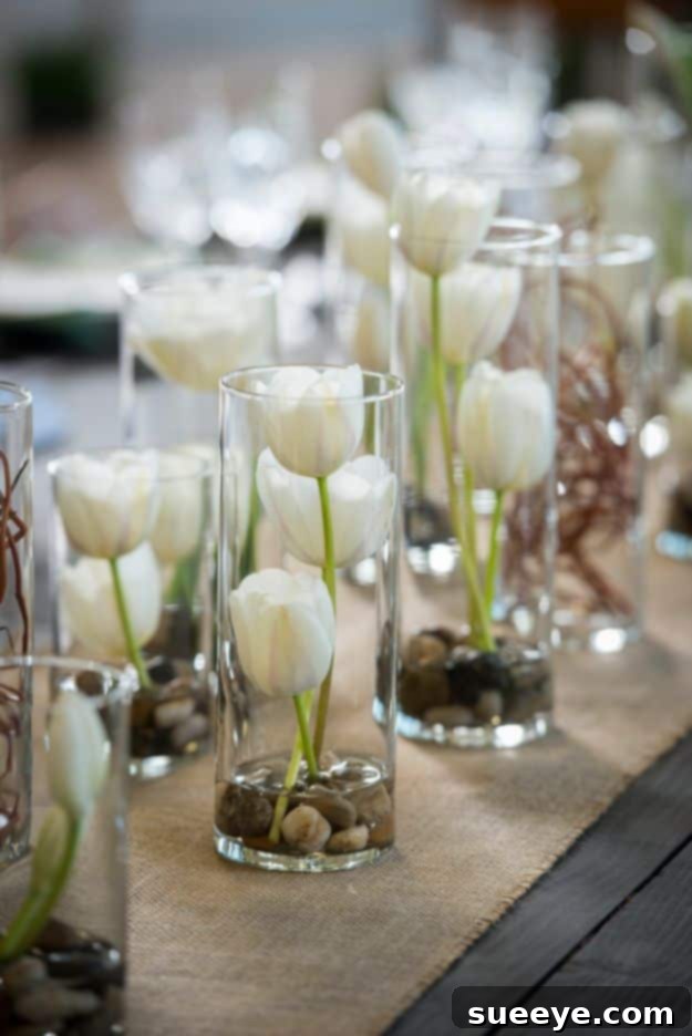 DIY Wedding Centerpieces - Tulips In Glass Vases - Do It Yourself Ideas for Brides and Best Centerpiece Ideas for Weddings - Step by Step Tutorials for Making Mason Jars, Rustic Crafts, Flowers, Modern Decor, Vintage and Cheap Ideas for Couples on A Budget Outdoor and Indoor Weddings #diyweddings #weddingcenterpieces #weddingdecorideas DIY Wedding Centerpieces - Tulips In Glass Vases - Do It Yourself Ideas for Brides and Best Centerpiece Ideas for Weddings - Step by Step Tutorials for Making Mason Jars, Rustic Crafts, Flowers, Modern Decor, Vintage and Cheap Ideas for Couples on A Budget Outdoor and Indoor Weddings #diyweddings #weddingcenterpieces #weddingdecorideas