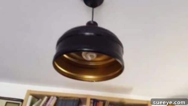 Upcycled Glass Jug Pendant Light DIY Jug Pendant Light - creative upcycled lighting for kitchen decor
