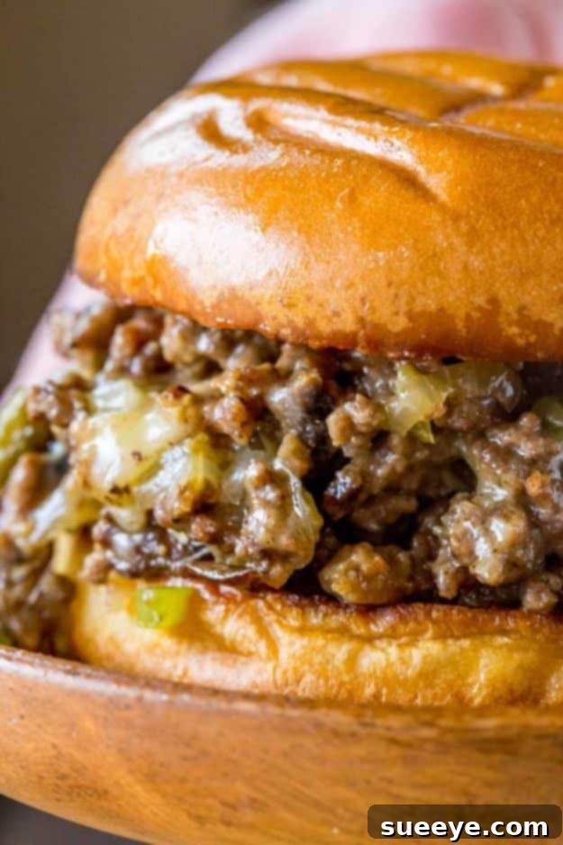 Philly Cheese Steak Sloppy Joes Philly Cheese Steak Sloppy Joes in a bun with melted cheese
