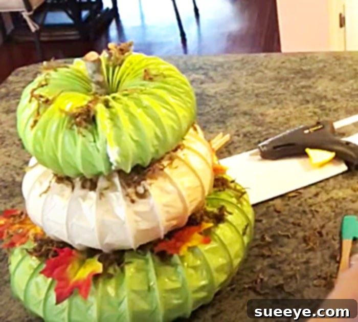 The Dryer Duct Hack for Perfect Pumpkin Topiaries 3 DIY Fall Pumpkin Crafts - Fall DEcor Ideas - Dryer Duct DIY