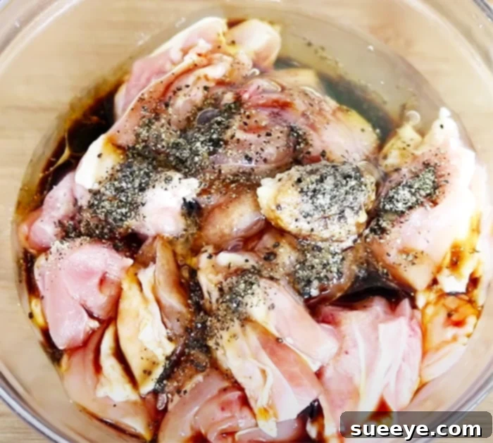 The Ultimate Homemade Sesame Chicken 2 Marinate Chicken Thighs For Flavorful Homemade Sesame Chicken - Chinese Food Recipes