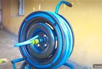 Repurpose an Old Tire into a Garden Hose Reel