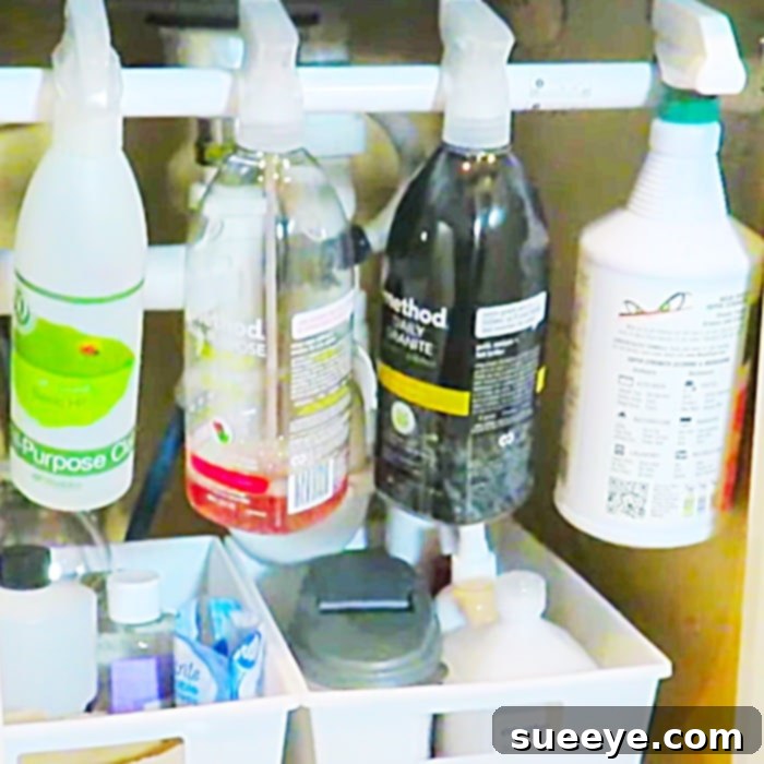 Conquer Under Sink Clutter With One Simple Rod 3 Easy Way To Organize Under The Sink Using A Tension Rod - Cleaning Hacks - Organize Under The Sink
