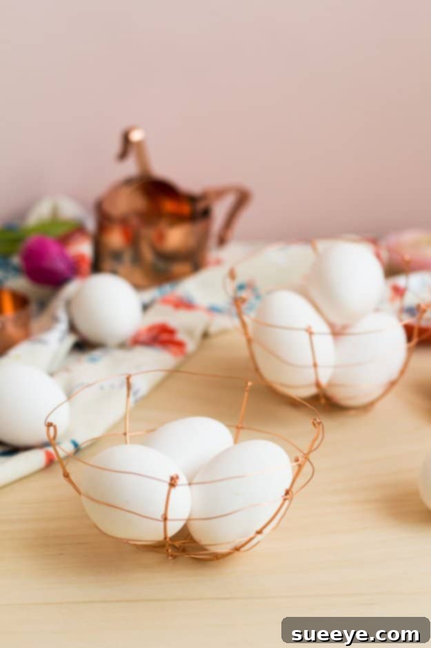 DIY Copper Wire Egg Baskets for Farmhouse or Modern Kitchens Handcrafted DIY copper wire basket holding fresh eggs on a kitchen counter
