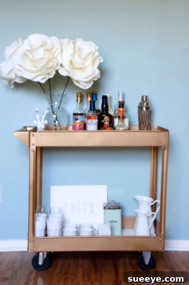 DIY Painted Gold Bar Kitchen Cart for Glamorous Entertaining Stylish DIY gold-painted bar cart transformed from a regular kitchen cart, ready for entertaining
