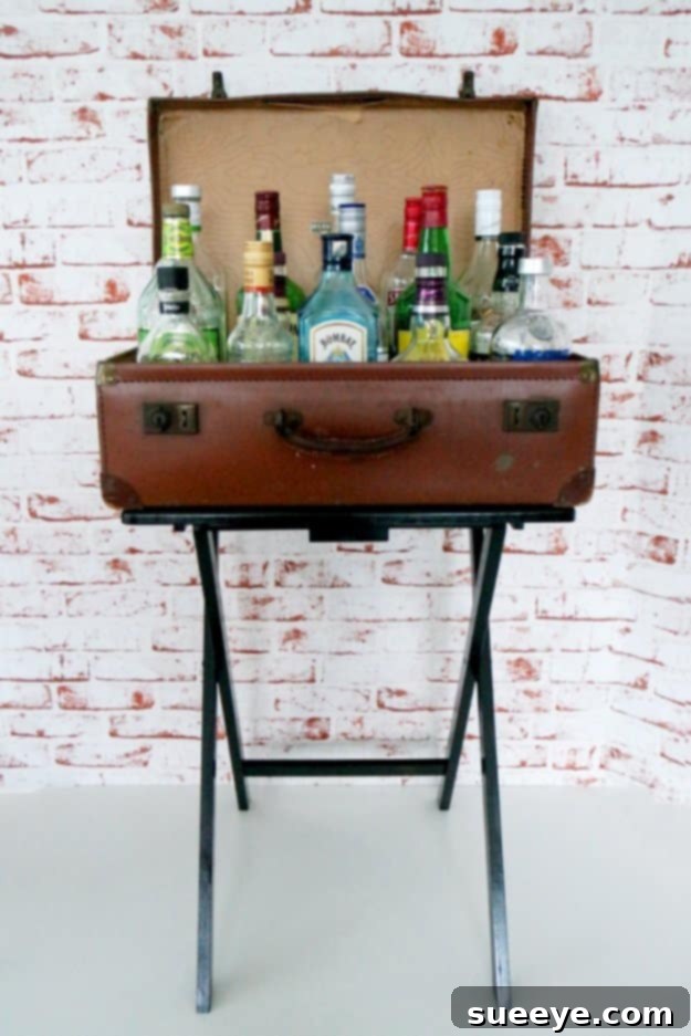 DIY Faux Bar Table for Small Kitchens and Apartments Space-saving DIY faux bar table with stools, set up in a compact kitchen or apartment